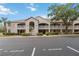 Charming condo building with well-maintained landscaping, reserved parking, and private balconies at 640 Cranes Way # 164, Altamonte Springs, FL 32701