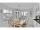 Charming breakfast nook with a round table and shuttered windows for natural light at 704 Pinnacle Dr, Haines City, FL 33844
