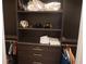 Closet with shelving, drawers, and hanging storage at 7465 Bleecker Ln, Kissimmee, FL 34747