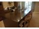 Spacious kitchen with a large island, stainless steel appliances, and ample counter space at 7465 Bleecker Ln, Kissimmee, FL 34747