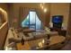 Spacious living room featuring a large sectional sofa and access to the patio at 7465 Bleecker Ln, Kissimmee, FL 34747