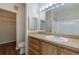 Bathroom features a large mirror and a medicine cabinet at 9117 Lee Vista Blvd # 603, Orlando, FL 32829