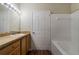 Bathroom includes large mirror, a bath tub, and updated features at 9117 Lee Vista Blvd # 603, Orlando, FL 32829