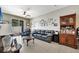 Comfortable living room boasting a sliding glass door, tile floors, and ample natural light at 9161 Shepton St, Orlando, FL 32825