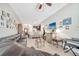 Bright living room boasting neutral colors, tile floors, and access to the kitchen at 9161 Shepton St, Orlando, FL 32825