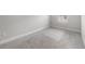 This bedroom has carpeted floors, neutral paint, base trim, and a window at 936 Wild Date Ln, Lake Mary, FL 32746