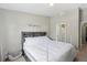 Bedroom featuring a bed and easy access to both a closet and bathroom at 104 Wilton Cir, Sanford, FL 32773