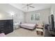 This bedroom features a large window and a vanity at 104 Wilton Cir, Sanford, FL 32773