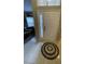 Inviting foyer featuring tile flooring and a decorative glass front door at 117 Anzio Dr, Kissimmee, FL 34758