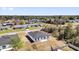 New construction featuring a modern design and spacious lot, surrounded by mature trees at 13584 Sw 43Rd Cir, Ocala, FL 34473