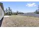 Large, level backyard enclosed by a white fence, offering privacy and space at 13584 Sw 43Rd Cir, Ocala, FL 34473