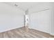 Spacious bedroom with ample closet space and wood-look vinyl flooring at 13584 Sw 43Rd Cir, Ocala, FL 34473