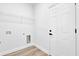 Functional laundry room with ample storage space and a utility sink hookup at 13584 Sw 43Rd Cir, Ocala, FL 34473