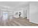 Bright, open-concept living space with modern kitchen island and stainless steel appliances at 13584 Sw 43Rd Cir, Ocala, FL 34473