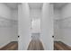 Open walk-in closet features wire shelving for ample storage at 13584 Sw 43Rd Cir, Ocala, FL 34473