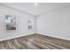Cozy bedroom with natural light and wood floors at 13594 Sw 40 Cir, Ocala, FL 34473