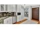 Modern kitchen features stainless steel appliances, granite countertops, and ample cabinet space at 14772 Eagles Crossing Dr, Orlando, FL 32837