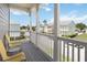 Balcony view overlooking street with other colorful houses at 1552 Fairview Cir, Reunion, FL 34747