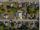 Aerial view of a single story home, showcasing its surroundings and neighborhood at 1716 2Nd Ne St, Winter Haven, FL 33881