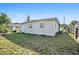 The spacious backyard has a serene setting with potential for landscaping at 1716 2Nd Ne St, Winter Haven, FL 33881