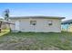 A fenced backyard offers a private retreat with potential for outdoor activities at 1716 2Nd Ne St, Winter Haven, FL 33881