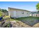 The backyard offers potential with ample space and a cozy, private setting at 1716 2Nd Ne St, Winter Haven, FL 33881