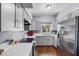 A kitchen showcasing modern appliances and white countertops for a bright and clean feel at 1716 2Nd Ne St, Winter Haven, FL 33881