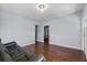 Open living room with hardwood floors and neutral walls at 1716 2Nd Ne St, Winter Haven, FL 33881