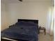 View of the Main bedroom featuring neutral walls and carpeted floors plus ensuite bathroom at 179 Blue Cypress Dr, Davenport, FL 33837