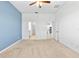 Spacious bedroom with connecting bathroom and view to modern kitchen at 1830 Estuary Ln, Kissimmee, FL 34747