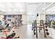 Full gym with weightlifting and cardio machines and mirrored wall at 1830 Estuary Ln, Kissimmee, FL 34747