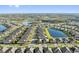 Aerial view of a neighborhood with homes and lakes at 188 Olympus Way, Kissimmee, FL 34759