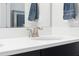 Close-up of a bathroom sink featuring sleek faucets and a clean, modern design at 188 Olympus Way, Kissimmee, FL 34759