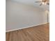 This spacious bedroom features wood-look flooring and neutral walls, ready for personalization at 2015 Sandy Garden Ln, Winter Garden, FL 34787