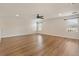 Spacious bonus room with laminate floors, a ceiling fan, and natural light at 2015 Sandy Garden Ln, Winter Garden, FL 34787