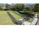 Neighborhood dog park, offering a fenced area for pets to exercise and socialize in a secure environment with a bench for humans at 2015 Sandy Garden Ln, Winter Garden, FL 34787
