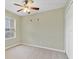 Bedroom featuring plush carpeting, neutral walls, a ceiling fan, a window, and a closet at 2040 Retreat View Cir, Sanford, FL 32771