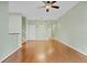 Spacious living room showcasing hardwood floors and an open layout at 2040 Retreat View Cir, Sanford, FL 32771