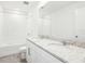 Well-lit bathroom featuring dual sinks, granite countertops, and a shower-tub combination at 2097 Rosewood Dr, Bartow, FL 33830