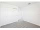 Bright bedroom with neutral carpet, closet, and ample space at 2097 Rosewood Dr, Bartow, FL 33830