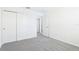 Bright bedroom with neutral carpet, closet, and ample space at 2097 Rosewood Dr, Bartow, FL 33830