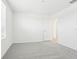 Bright, airy bedroom with neutral carpet and white walls offering a blank canvas for personalization at 2098 Rosewood Dr, Bartow, FL 33830