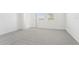 Well-lit bedroom features plush carpet, bright walls, and an inviting double window at 2098 Rosewood Dr, Bartow, FL 33830