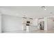 Open-concept kitchen with white cabinetry and stainless steel appliances at 2105 Rosewood Dr, Bartow, FL 33830