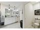 Bright bathroom featuring double vanities, a large mirror, and modern fixtures offering comfort and convenience at 211 Lazio Cir, Debary, FL 32713