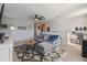 Relaxing living room area with a comfortable couch and stylish decor at 211 Lazio Cir, Debary, FL 32713