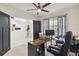 Cozy home office area with a large desk and comfortable executive chair at 211 Lazio Cir, Debary, FL 32713