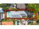 Aerial view showcases this home and backyard pool, surrounded by lush greenery at 250 Cortland Ave, Winter Park, FL 32789