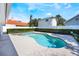 Private backyard oasis featuring a kidney-shaped pool with an adjacent spa, offering the ultimate relaxation space at 250 Cortland Ave, Winter Park, FL 32789