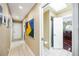 Hallway features tile flooring and access to bathroom and other rooms, complemented by neutral wall color at 250 Cortland Ave, Winter Park, FL 32789